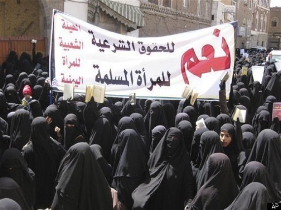 A crowd of Muslim women protest child marriages